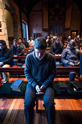 Catholic student priests at the Corpus Christi College during morning prayer.