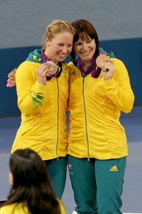 Kaarle McCulloch (left) celebrates her team sprint bronze medal with Anna Meares.