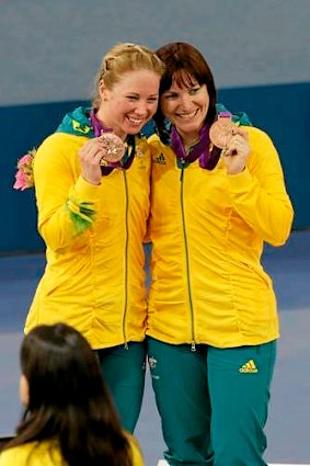 Kaarle McCulloch (left) celebrates her team sprint bronze medal with Anna Meares.