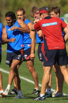 Aaron Davey and Mark Neeld get playful at training.