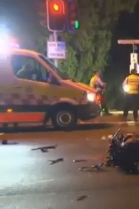 Two motorists were killed after a motorbike sped through a red light in Lane Cove on Saturday morning. 