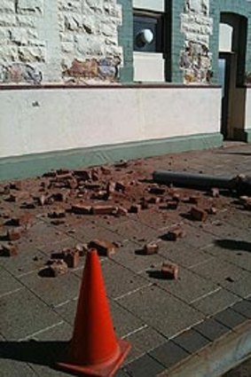 Bricks litter the streets of Boulder.