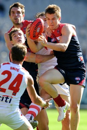 Jack Trengove marks against Sydney in round 1.