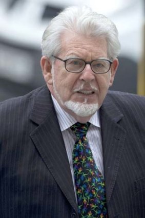 Court date: Rolf Harris arrives at Westminster Magistrate's Court in London.