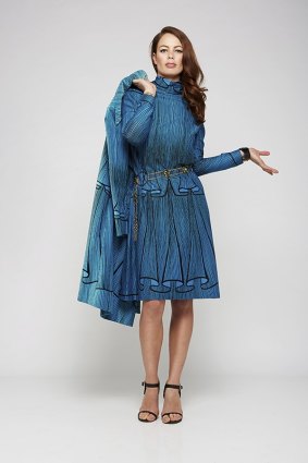 Blue and pleated: A two-piece suit featuring a velvet collared coat and a turtleneck long sleeve dress by Roberta di Camerino from about 1970.