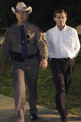 Raymond Jessop is escorted to the Schleicher County jail.
