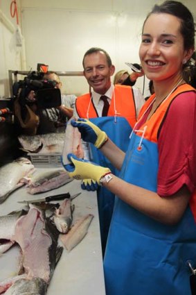 Hooked . . . Tony Abbott and his daughter Louise.