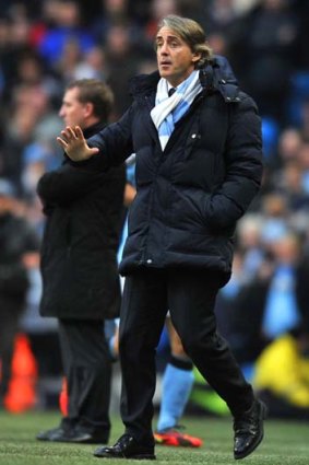 Roberto Mancini ... confident that he can still win the title this season with Manchester City.