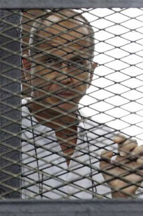 Al Jazeera journalist Peter Greste in a Cairo court.