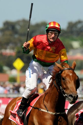 Damien Oliver was banished from racing for eight months over a gambling offence.