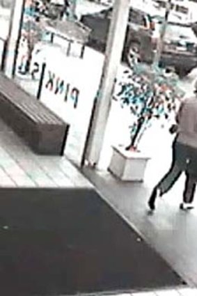Flower heist ... footage of a woman suspected of theft in Double Bay.