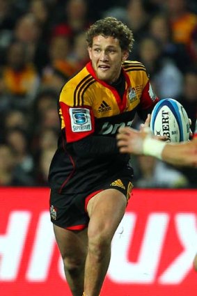 Tawera Kerr-Barlow looks to pass during the Super Rugby semi-final against the Crusaders.