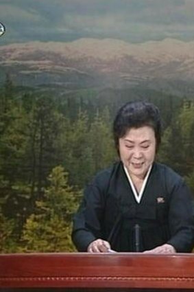 A tearful announcer dressed in black announces the death of North Korean leader Kim Jong-il on North Korean State Television in this still image from video December 19, 2011.