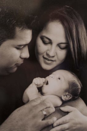 Marlise Munoz, her husband, Erick Munoz, and their son, Mateo, at 3 weeks old.