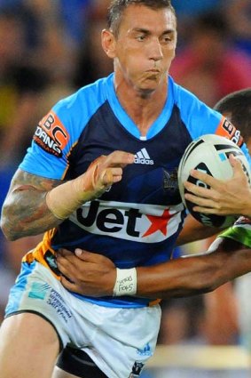 Boost . . . Mat Rogers returns from injury for the Titans.