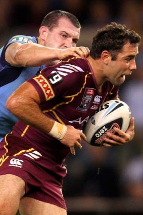 On his back &#8230; Cameron Smith is tackled by Paul Gallen on Wednesday night.