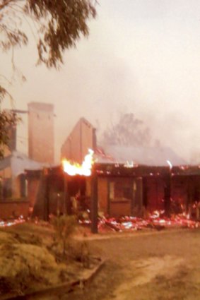 Ron and Anne Sorraghan's mudbrick home burns.