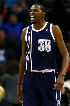 Kevin Durant yells to his teammates during the game against the Charlotte Bobcats.