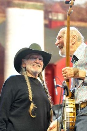 Pete Seeger and Willie Nelson on stage during the Farm Aid 2013 concert at Saratoga Performing Arts Center in Saratoga Springs, N.Y.