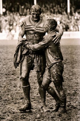 Norm Provan and Western Suburbs captain Arthur Summons after famous 1963 grand final in the photograph which became the model for the NRL premiership trophy.