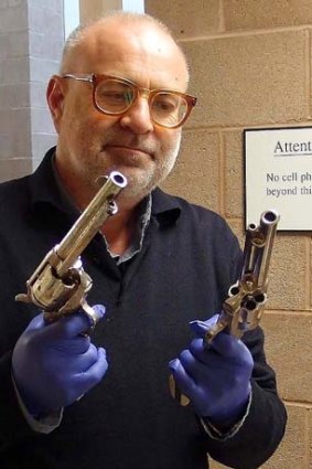 Idol: Dr Derham Groves with Hopalong's guns.