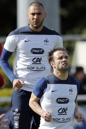 France teammates Karim Benzema and Mathieu Valbuena during training session earlier this year.