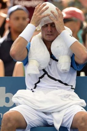 Career not on ice ... Lleyton Hewitt attempts to cool down in Brisbane.