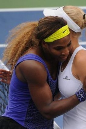 Serena Williams and Wozniacki embrace after a match at the Western & Southern Open.