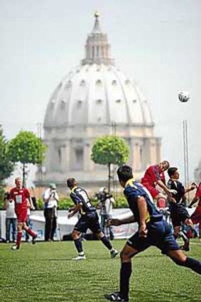 The North American Martyrs, in red, and the Redemptoris Mater teams compete in the finals of the Clericus Cup in Rome.