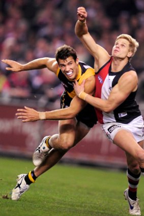 Into battle:  Alex Rance (left) has Saint  Nick Riewoldt in his sights as he looks to mark.
