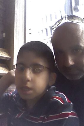 Mr Zahr with Mohamed Ali, 12. Both his children have myotonic dystrophy. 