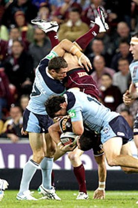 Tensions boiled over after this spear tackle on Darius Boyd.