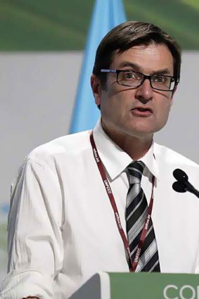 Climate Change Minister Greg Combet speaks at the Cancun summit.