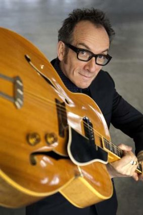 Elvis Costello beats set-list stagnation with his spinning songwheel.