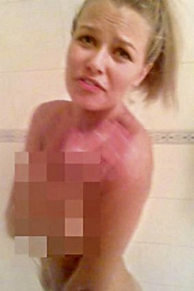 Shower glower … the controversial nude shower photo of Bingle, allegedly taken by AFL player Brendan Fevola.