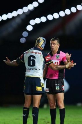Disbelief: Cowboys captain Jonathan Thurston argues the point with referee Gavin Badger.