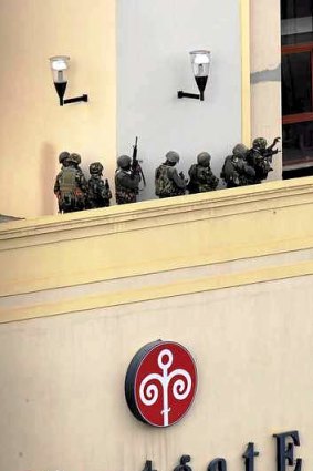 Kenya Defence Forces soldiers comb the rooftop of the Westgate shopping mall, on the fourth day of the Nairobi siege. Picture Reuters
