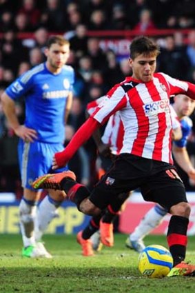 Brentford's Harry Forrester scores his side's second goal from the penalty spot.