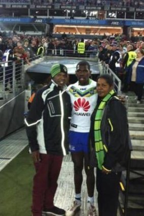 Raiders debutant Edrick Lee with his parents Samuel Lee and Connie Blankett at ANZ Stadium last Friday.