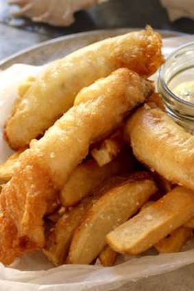 Fish and chips with tartare sauce.