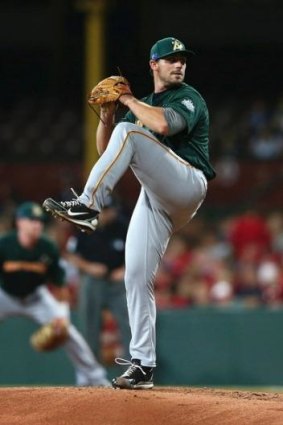 Tim Atherton in action for Australia against the Arizona Diamondbacks. He's returning to the Canberra Cavalry.
