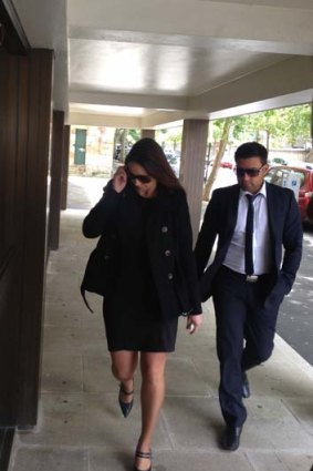 Rebeca Triscaru, best friend of Lisa Harnum, entering the NSW Supreme Court.