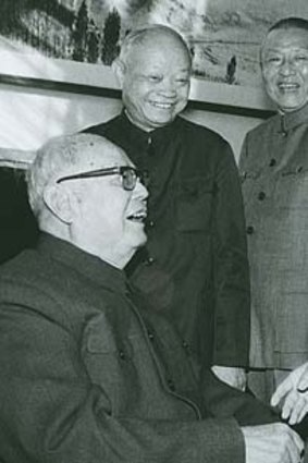 Xi Jinping's father, Xi Zhongxun (third from left), with Marshal Ye Jianying (sitting) shaking Hu Yaobang's hand.
