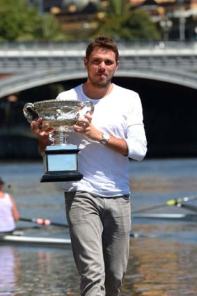 Surprised by crowd: Stanislas Wawrinka with his trophy on Monday.
