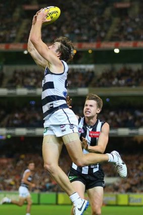 Jordan Murdoch of the Cats marks in front of Tom Langdon of the Magpies during a round three match on April 5.
