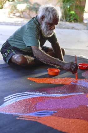 Back with family: Tommy Watson in Alice Springs.