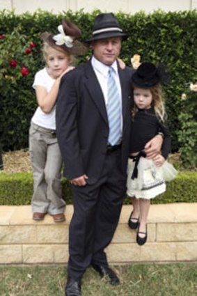 ‘‘We always play dress-ups at home’’ ... Peter Phelps with daughters Aja Blue and Polly.