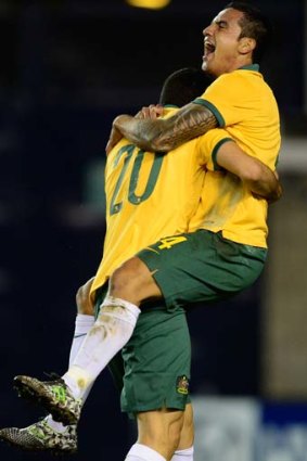 Tim Cahill of Australia celebrates a goal in the first half.