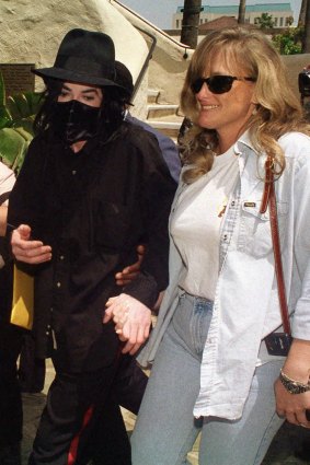 Michael Jackson pictured in 1996 with his thens wife Debbie Rowe.