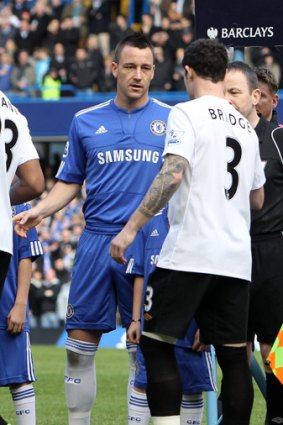 Air swing...Manchester City's Wayne Bridge ignores the extended hand of former friend John Terry of Chelsea before the much-anticipated showdown